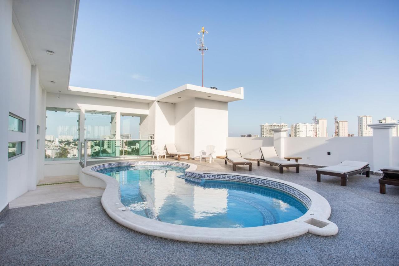 Capital O Cancun Ocean View, Cancun Dış mekan fotoğraf Rooftop pool